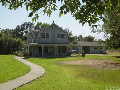 Main House, Garage and Sidewalk leading between Ho