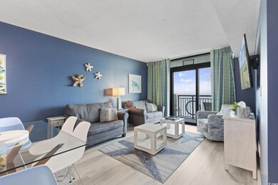 Living room with a textured ceiling, floor to ceil