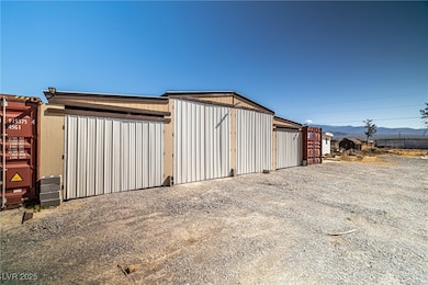 Garage featuring a mountain view