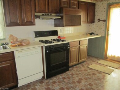Kitchen view showing Dishwasher and Stove, notice 
