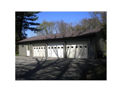 3 Car Garage with Work Area.