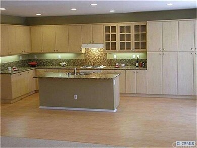Lots of cabinet space, and beautiful glass doors.