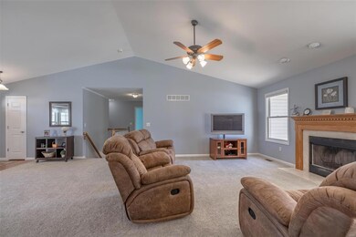 Great room with fireplace and vaulted ceiling