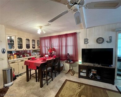 Formal dining area with built-in cabinets.