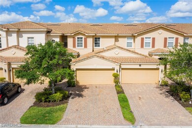 The tile roof & pavers give this exterior a classy