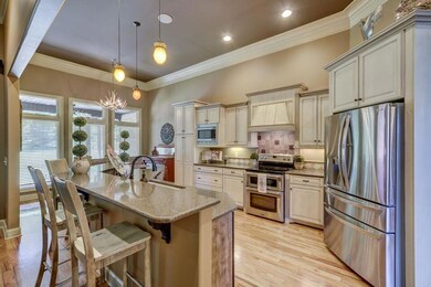 Gorgeous kitchen with a custom vent hood!
