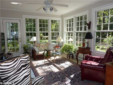 Patio/Deck - Florida room overlooking a patio and 