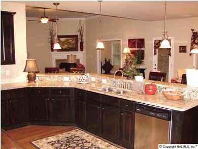 Oversized Kitchen with enough room at the serving bar to seat 6 or 7 bar stools