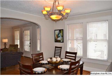 Gracious, larged arched doorway from living room i