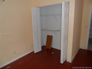 closet of small bedroom downstairs