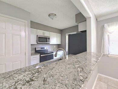 5636 Birchmont Dr unit 21, Houston, TX 77091 - photo 5