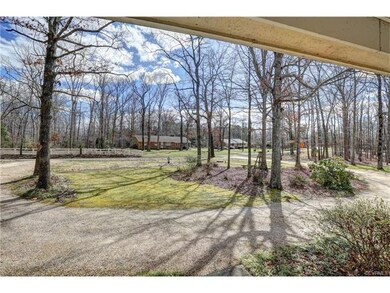 Street view from front porch showing circular driv