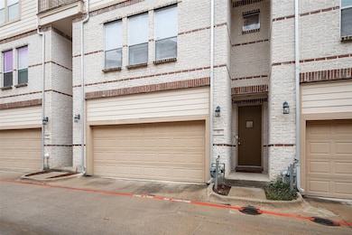 A covered porch welcomes you to this lovely condo!