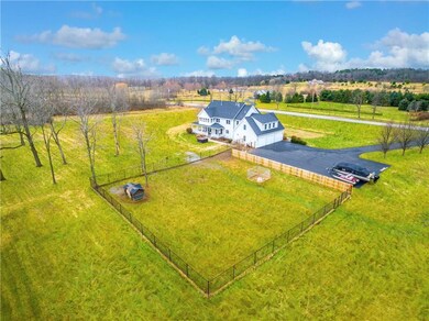 Fenced area of backyard for pets, horses, or a gar