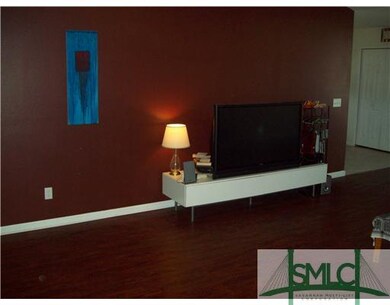 Living Room. Has a large open living area w/ hardw