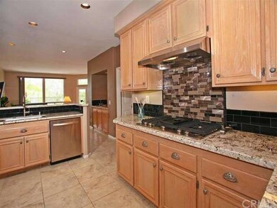 Another view of the Kitchen looking toward the Fam