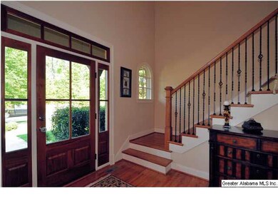 Handsome entry system with foyer that opens to lar