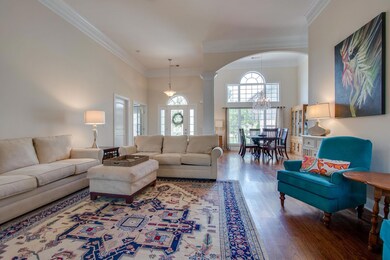 12ft ceilings, grand archways and beautiful crown molding featured throughout the home.