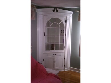 Exterior Front. Beautiful built in cabinet.  Room