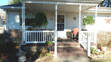 Covered Front Porch Welcomes You Home