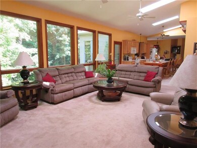 LIVING ROOM WITH ACCESS TO SMALL REAR DECK, AND VA