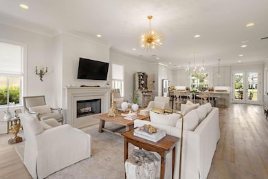 View of main living spaces as you enter the front door.