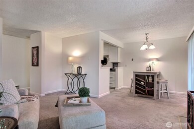 Ooh la la — this is the one! Unpack, settle in, and start making beautiful new memories in this charming ground floor retreat. With its fresh updates, cozy vibe, and peaceful setting, it’s more than just a home — it’s your happy place in Federal Way!