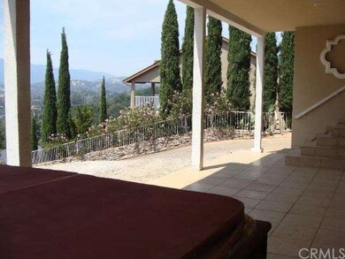 Tiled patio. Includes hot tub for soaking in and e