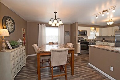 The Breakfast Room flows into the Kitchen, with an