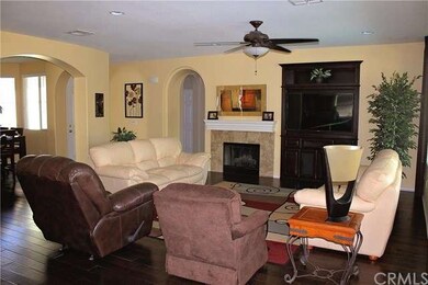 Open Family Room with Fireplace and Built In Media