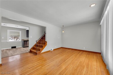 Unfurnished living room featuring light hardwood / wood-style floors