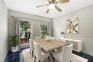 Virtually staged - dining room. Accessible from th