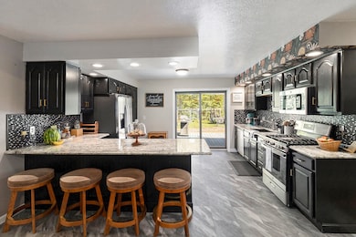 2371 E Mullett Lake Rd, Indian River, MI 49749 - photo 7