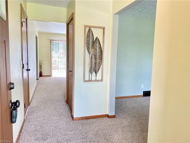 From the front door you can see the living room and the dining rooms