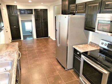 Eat in kitchen with built in storage!