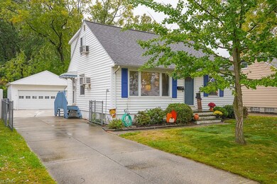 View of front facade featuring a front lawn and a 