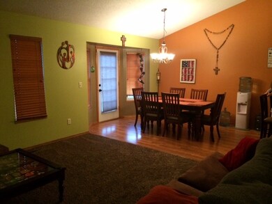 Wood flooring in kitchen and dining area