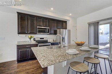 Kitchen is equipped with stainless steel appliance