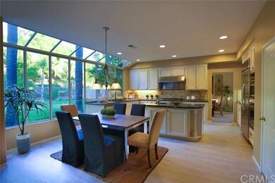 Large kitchen with atrium window, eating area, gra