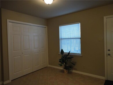 Eating area with large laundry closet.