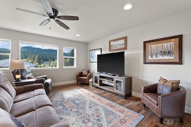 The living room offers beautiful views and abundant natural light