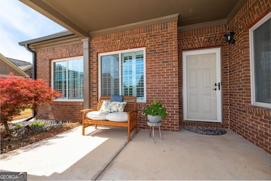 Perfect front porch for morning coffee, an evening cocktail, or chatting with neighbors.