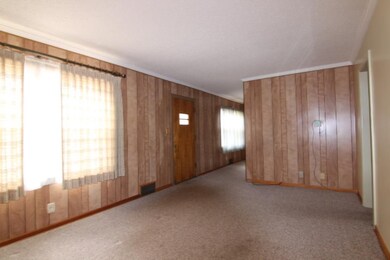Living Room (Hardwoods under the Carpet)