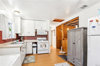 kITCHEN HAS LAMINATE FLOORING