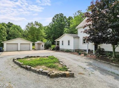Two car garage and shed