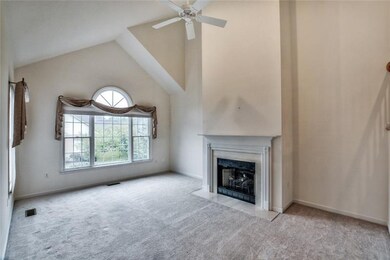 Beautiful vaulted living room with gas fireplace