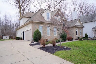 Double wide Concrete driveway with new garage door
