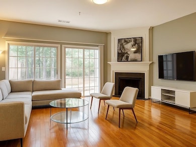 Living room featuring hardwood / wood-style floors and a fireplace