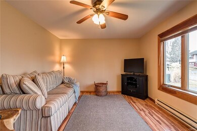 Living room with large bay window.  Lots of light!