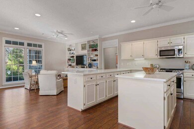 Airy kitchen opens to living area